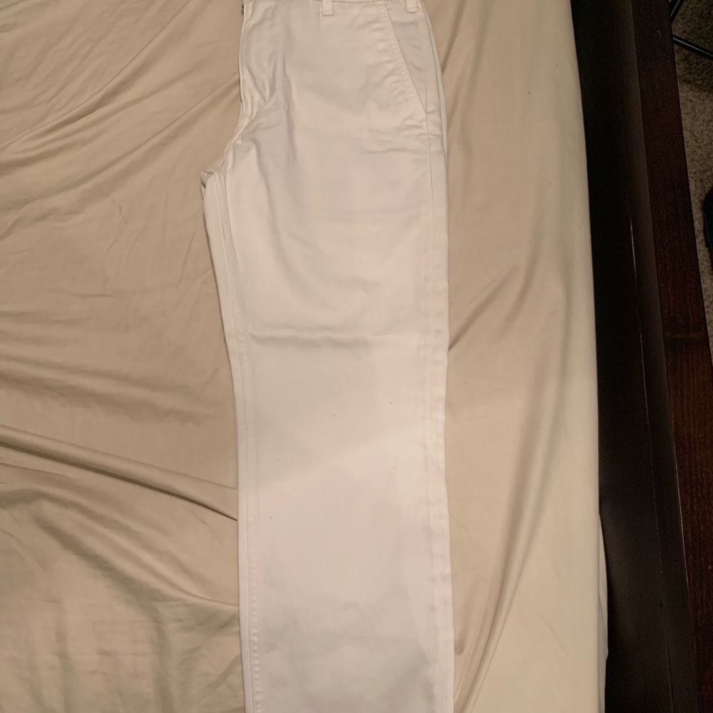 Men’s Levi’s all white jeans.